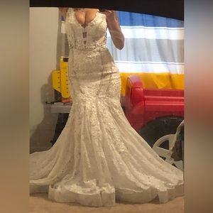 Couture mermaid wedding gown Swarovski crystals and lace. Worn for photos only